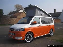 Ultimate Adventure Awaits: VW Transporter SWB Camper in Vibrant Orange – U10004
